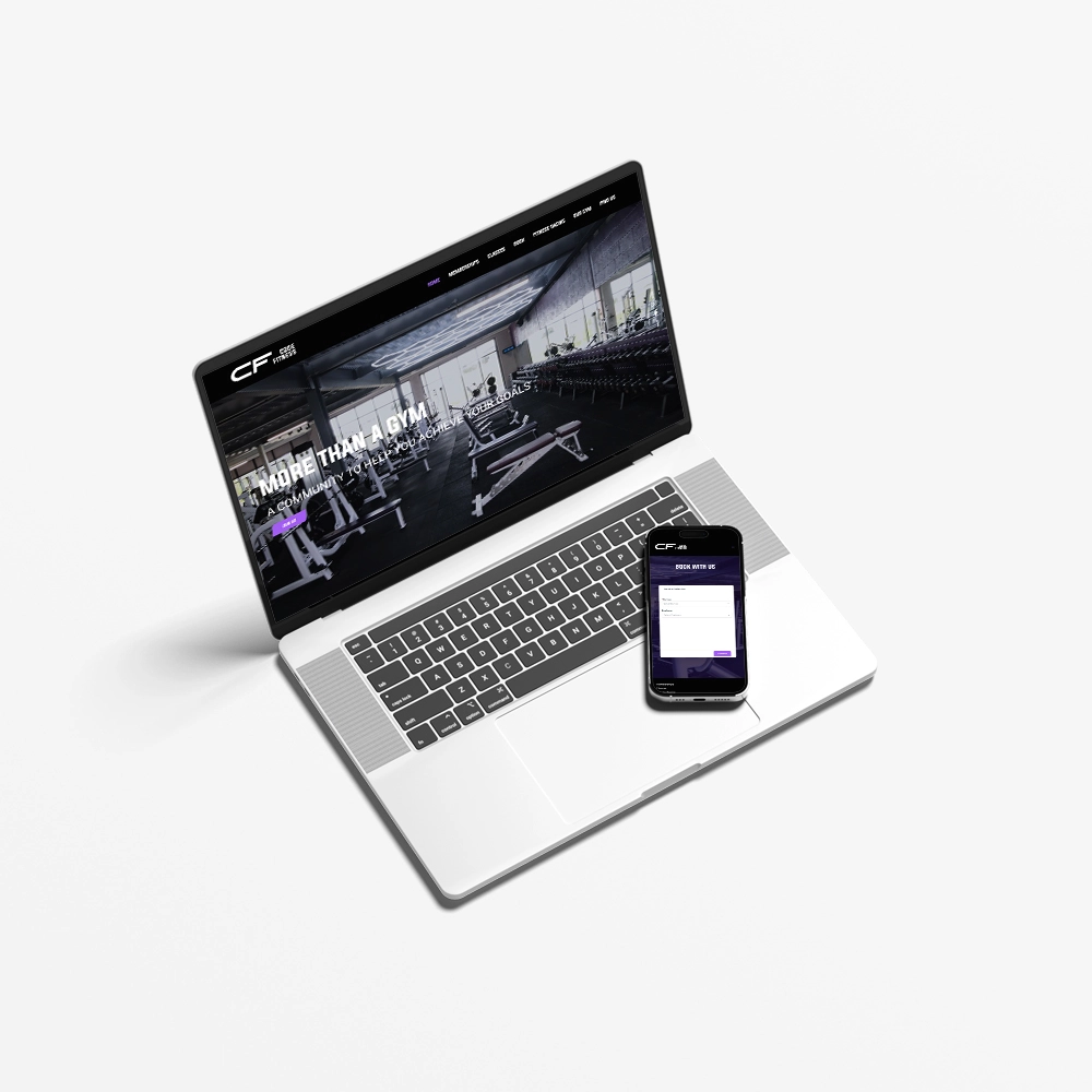 Mockup of the Code Fitness website on a laptop and mobile phone