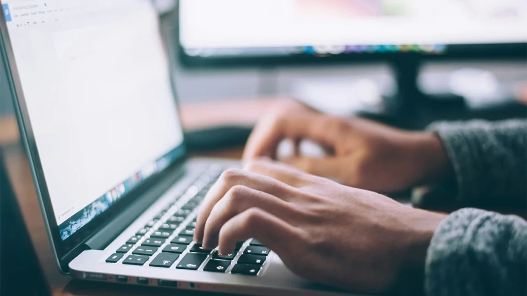 Person using MacBook Pro