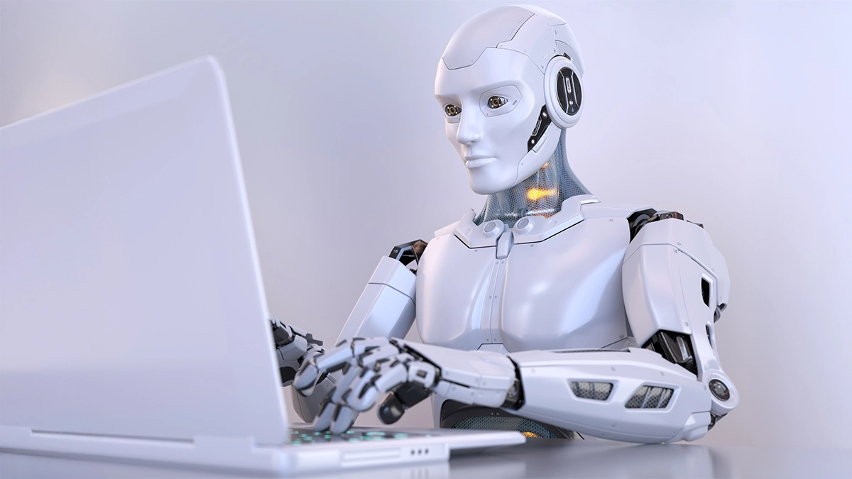 Robot working on a laptop