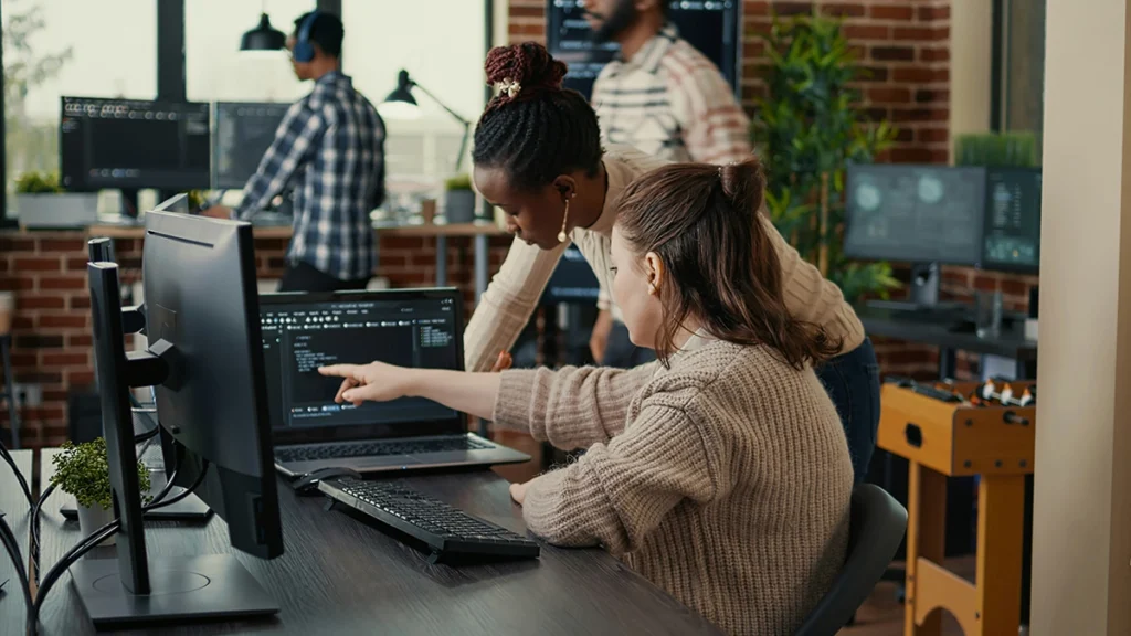 Web developer working with client on website