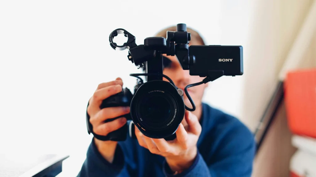 Man holding a video camera