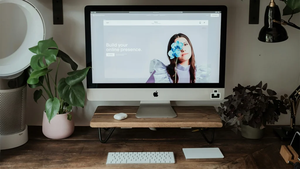 Computer with Squarespace home page