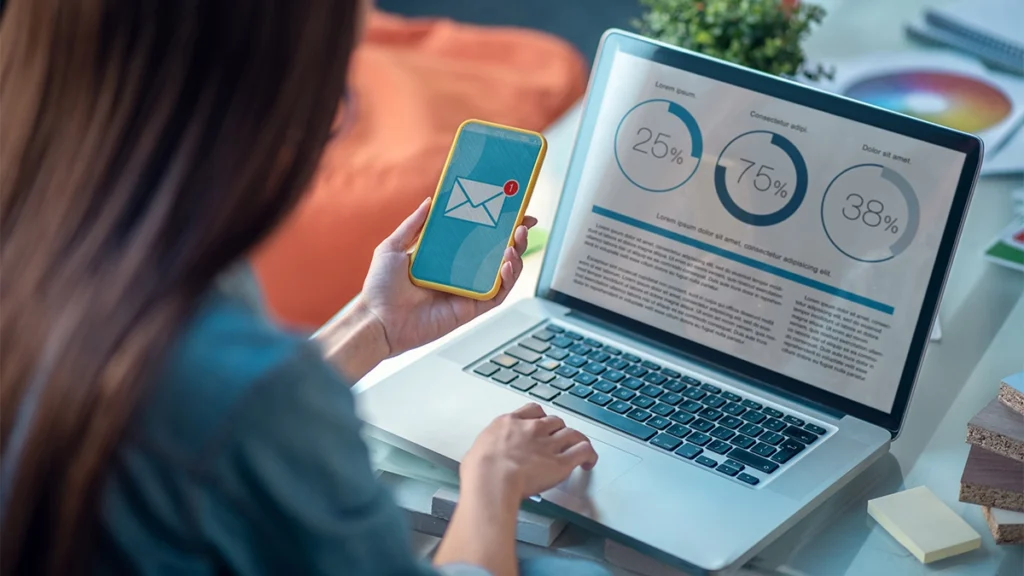 Woman looking at the notification while receiving an email on her phone