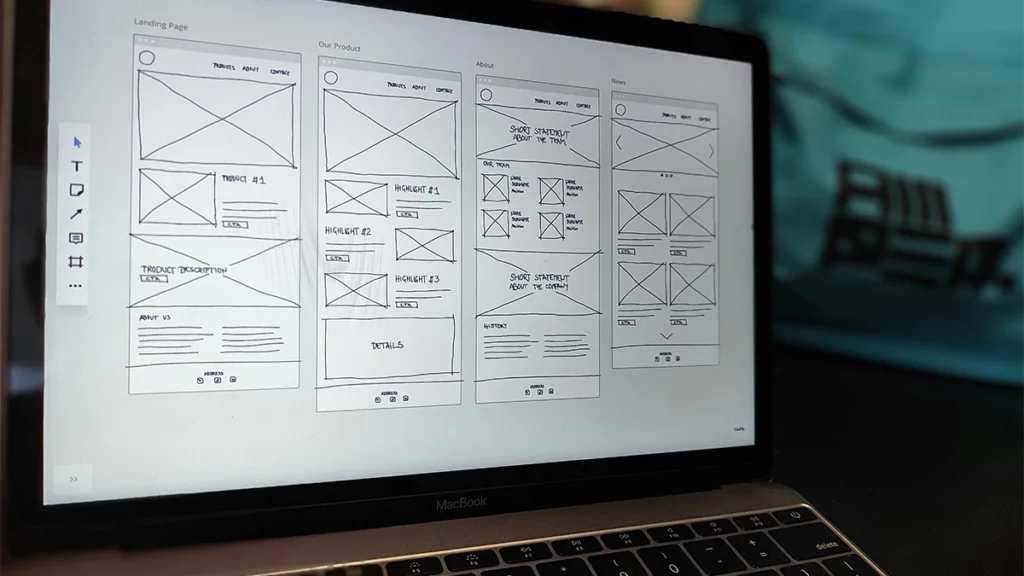 Laptop with UX wireframes