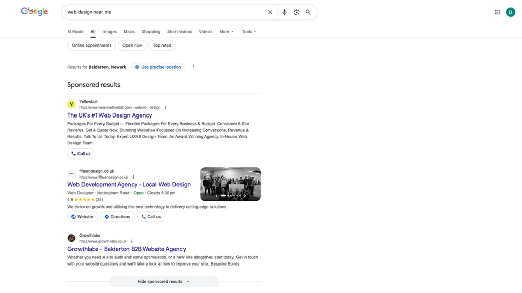 Screenshot of Google SERP with sponsored results at the top