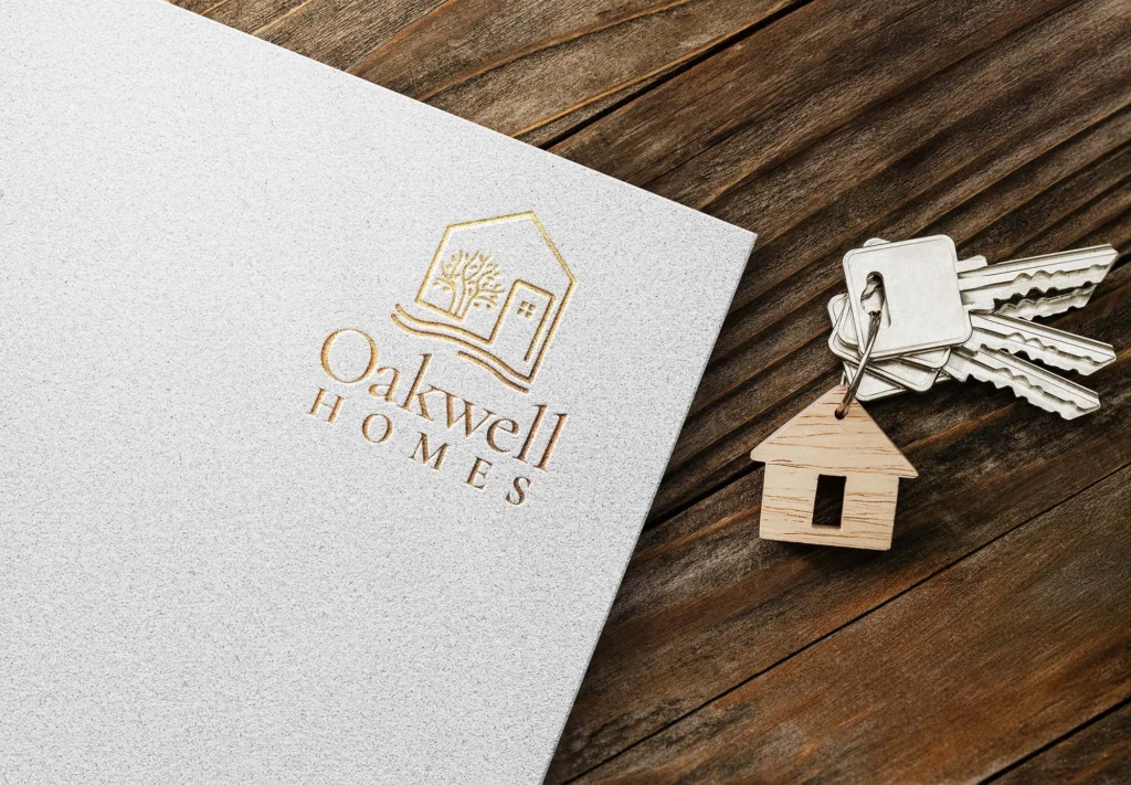 Paper sitting on a desk and the Mockup of Oakwell Homes logo on paper