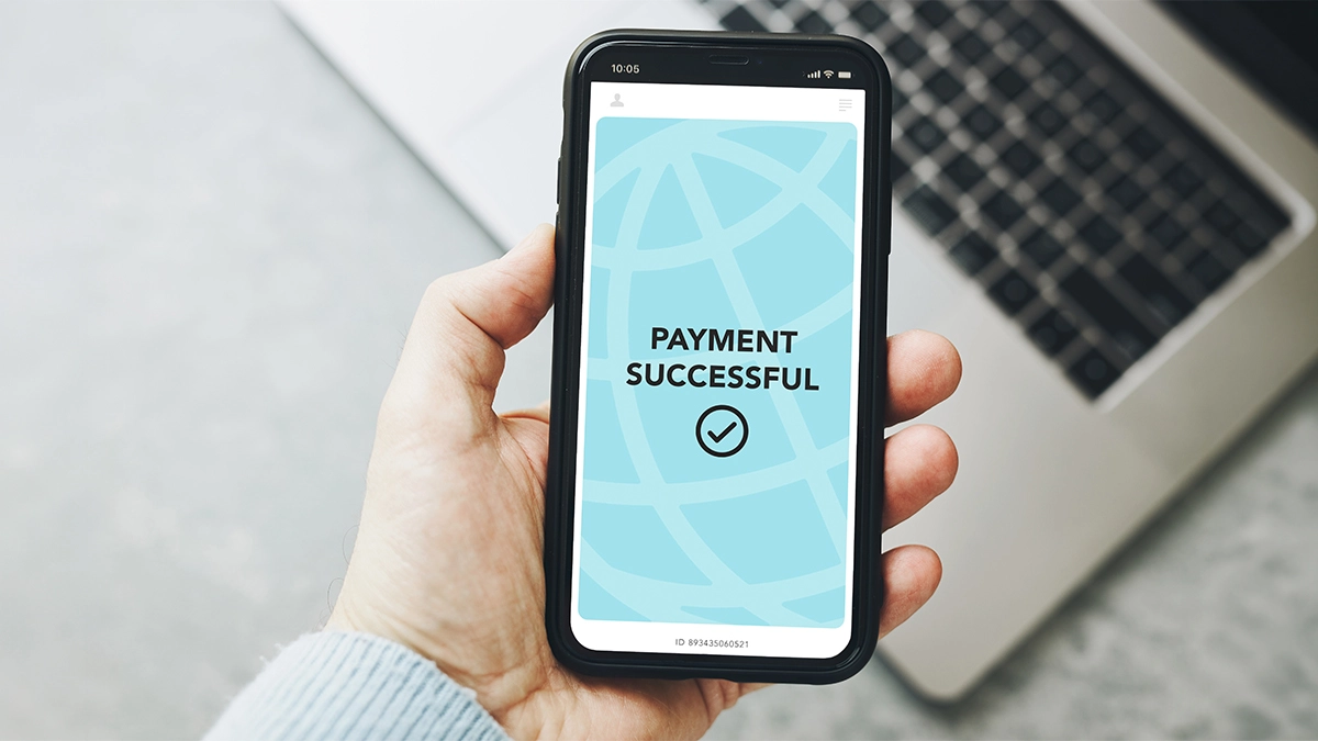 Man paying with smartphone for online shopping