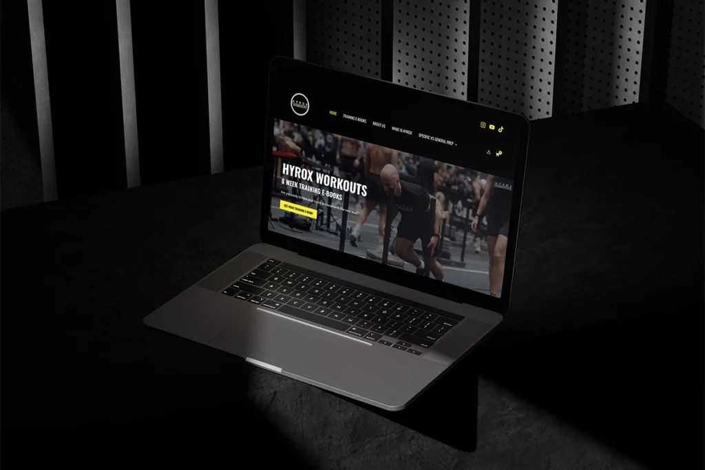 Laptop with mockup of the Hyrox Workouts website
