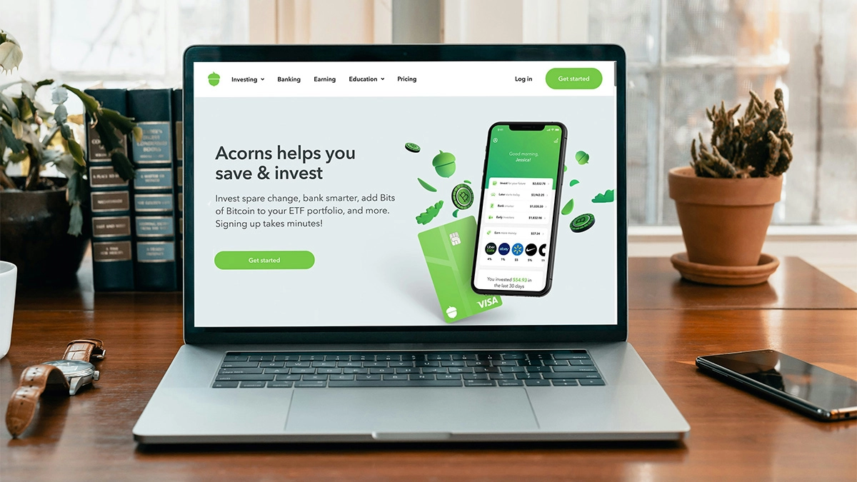 Laptop sitting on a desk with the landing page for a website