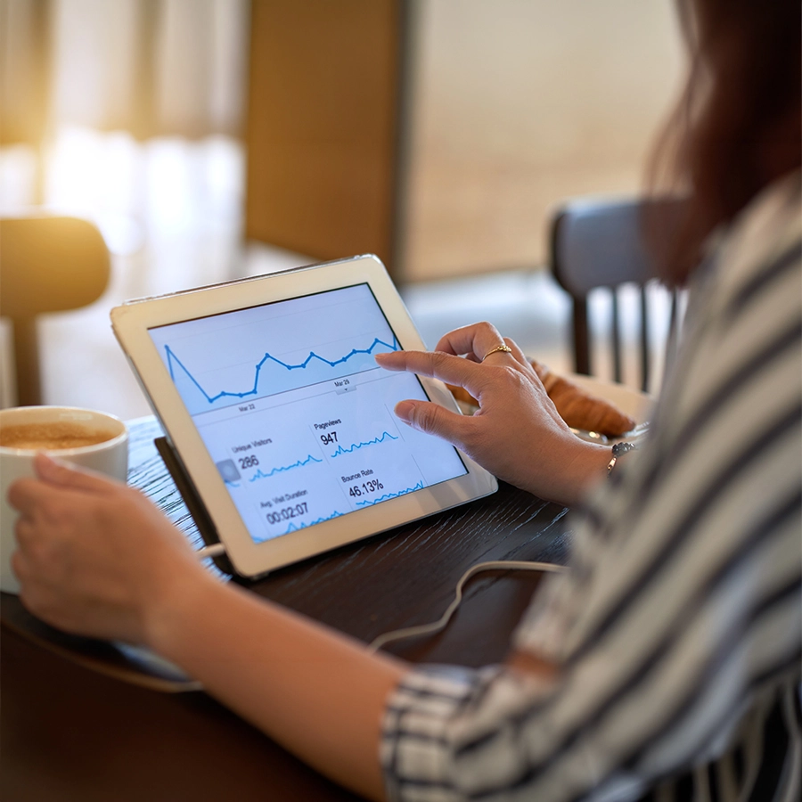 Business analytics on tablet device during lunch break