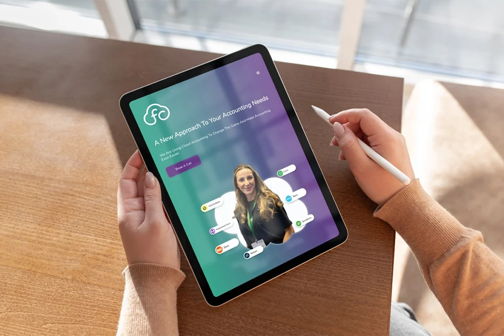 Lady holding a tablet looking at the Future Cloud website